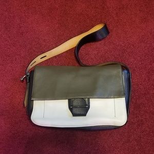 Pre-loved Reed Krakoff messenger bag gain leather